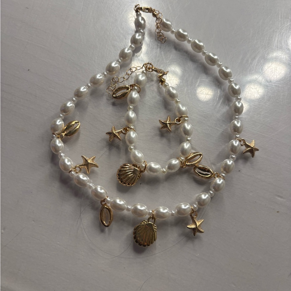 Elegant Pearl and Gold Charm Necklace Set